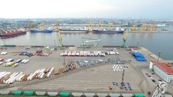 Seaport with cranes, ships, containers and cargo in Saint-Petersburg, Russia