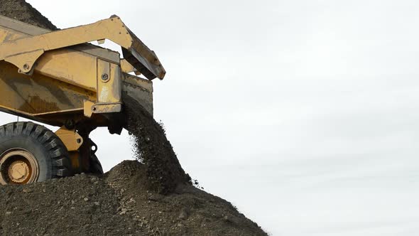 Truck Unloading Sand alt