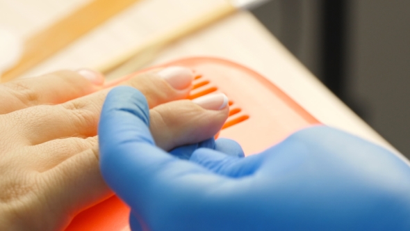 Applying Nail Polish On Nails With a Brush For Applying Nail Polish On Fingers alt