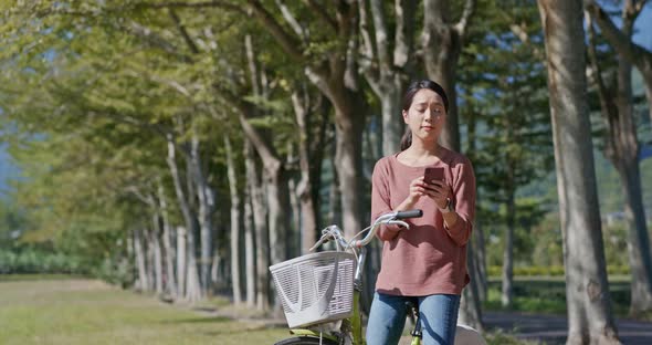 Woman ride a bike alt