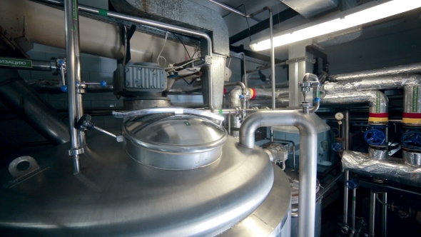 Pipe System, Pipelines With Valves And Storages At Modern Plant, Factory Indoor. alt