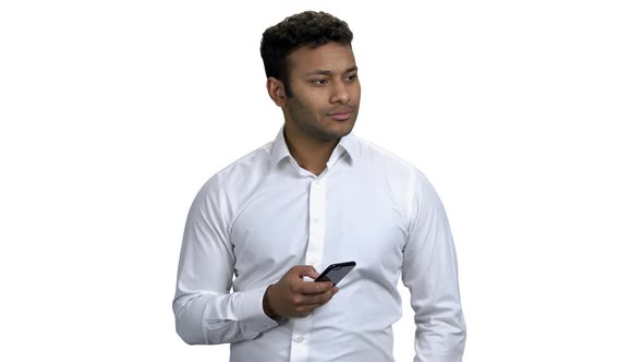 Young Man Taking Photo with Mobile Phone alt