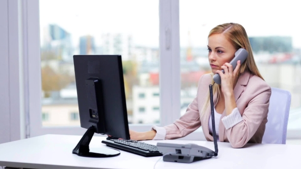 Angry Businesswoman With Computer And Telephone 27 alt