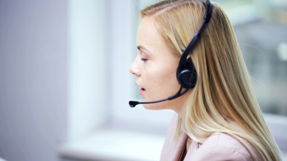 Businesswoman With Headset Talking At Office 76 alt