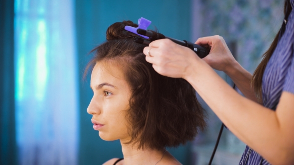 Professional Stylist Makes for an Attractive Brunette Curls alt
