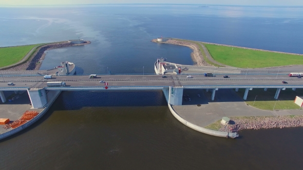 Aerial view of road bridge over water, which is at the dam in kronshtadt
