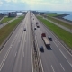 aerial view of the highway on the dam in kronstadt which go cars - VideoHive Item for Sale