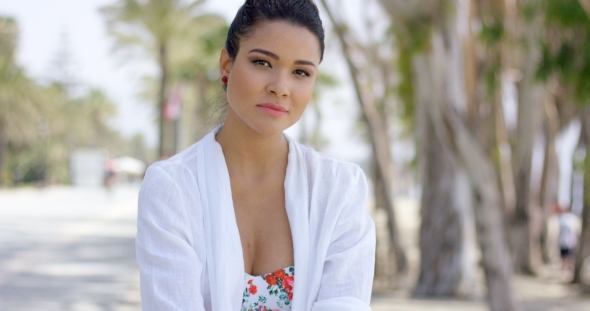 Confident Woman In Tropical Beach Scene alt