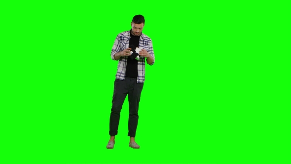 Surprised Man Uses Virtual Reality Goggles. Green Screen, Stock Footage