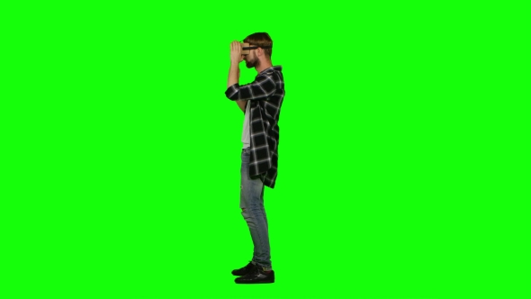 Virtual Reality Gamer Playing With a VR Headset. Green Screen, Stock ...