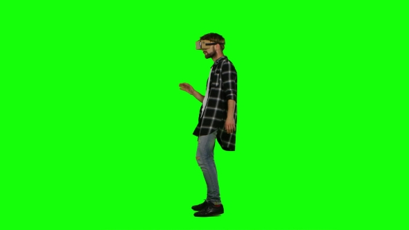 Man Turning His Head With a VR Virtual Reality Headset On alt