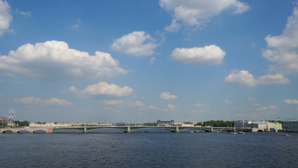 beautiful landscape with sailing on the river ships, the bridge and the clouds alt