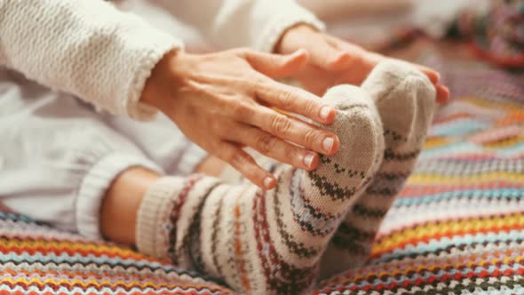 Adult woman doing sport healthy exercise inside camper van bedroom. Health and good lifestyle female alt