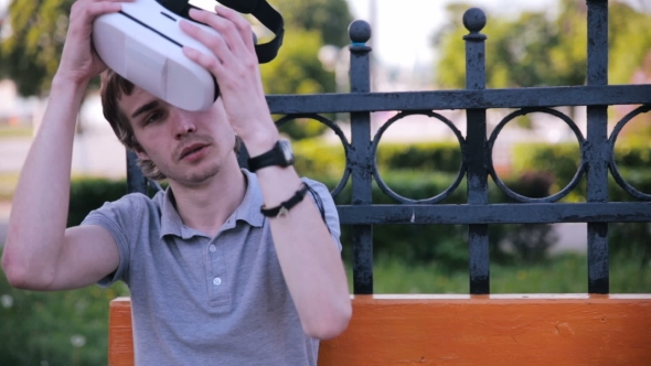 Young Man In Virtual Reality Glasses alt