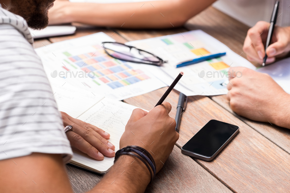 Students writing notes - Stock Photo - Images