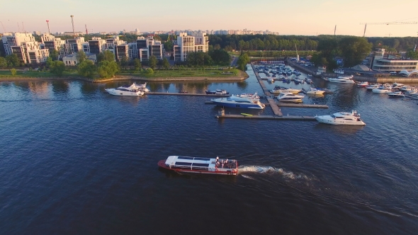 The river slowly floating tourist ship at sunset alt