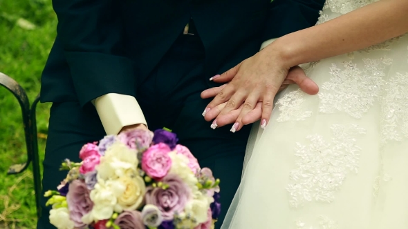 Bride And Groom Holding Hands