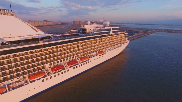 Aerial View Of The Cruise Ship In Harbor At Sunset