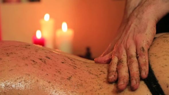 Massage With Mixture Of Herbs For a Woman