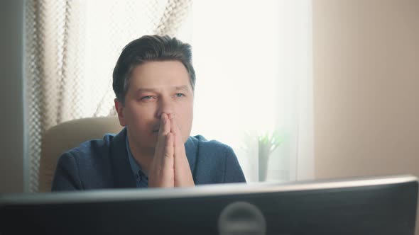 Man Reads a Prayer Folded His Hands alt