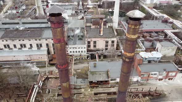 Aerial view of a drone flying over an industrial plant. Plant pipes. alt