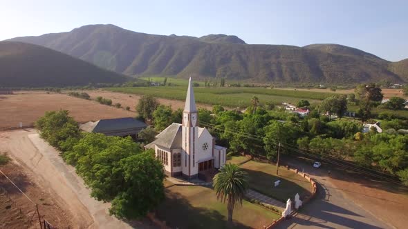 Aerial travel drone view of Oudtshoorn, Western Cape, South Africa. alt