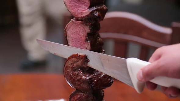 Cutting Meat From a Skewer