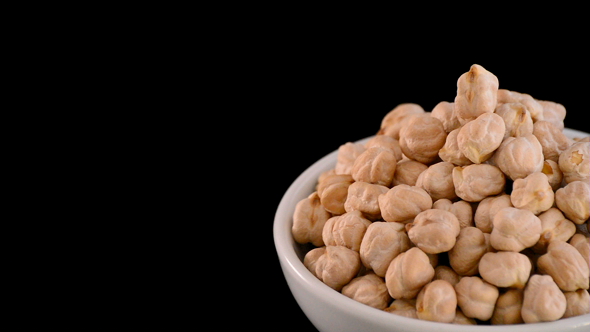 Garbanzos Chickpeas Gyrating on a Bowl alt
