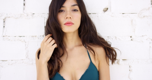 Seductive Young Woman With a Sultry Expression alt