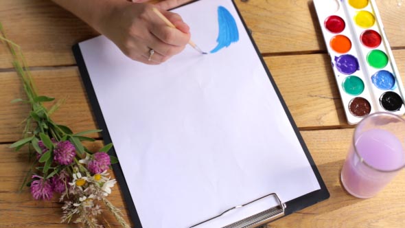 Artist Paints a Picture alt