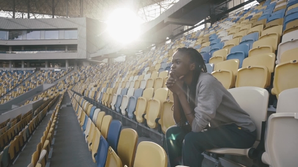 Thoughtful Young Attractive African American Woman Sitting 