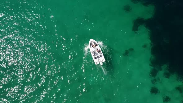 Bird'seye View of a Tourist Boat Sailing on the Sea on a Sunny Summer Day
