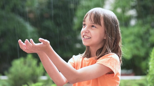 Girl Playing In Rain