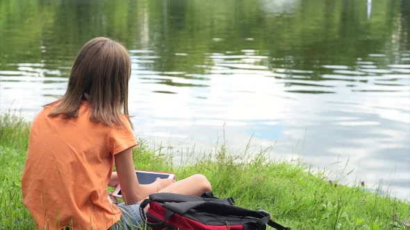 Little Girl At Lakeside