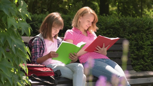 Mother and Daughter Reading Books