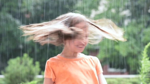 Girl Playing In Rain