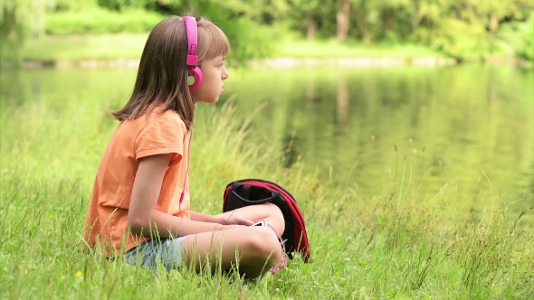 Little Girl At Lakeside