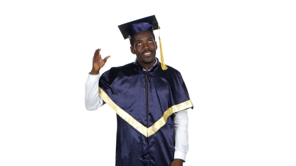 Graduate Picks Up Square Academic Cap And Throws. White alt