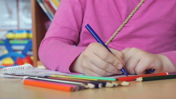 The Little Girl Draws The Pictures In The Copybook alt