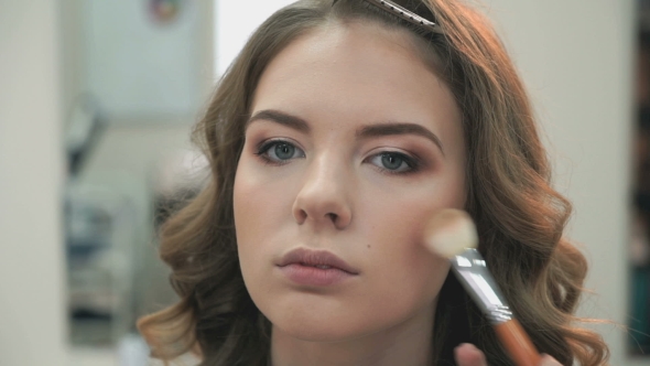 Makeup Artist Making Make-up For Young Model