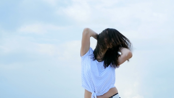 Beautiful And Cheerful Girl Having Fun Fooling Around Near The River alt