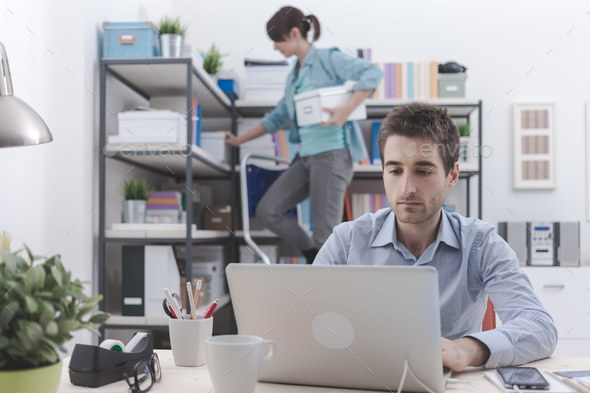 Two people working in the office - Stock Photo - Images