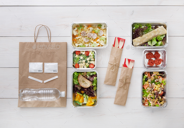 Healthy food take away in boxes, top view at wood - Stock Photo - Images