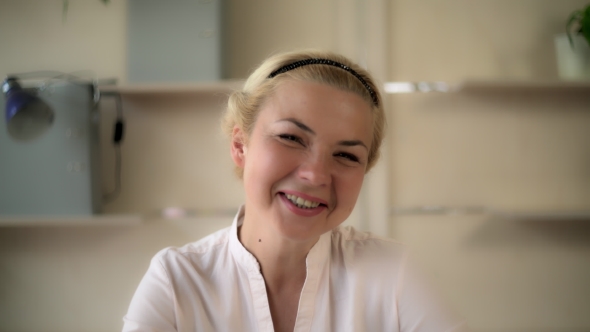Girl In The Office Wearing In Casual Pink Shirt. alt