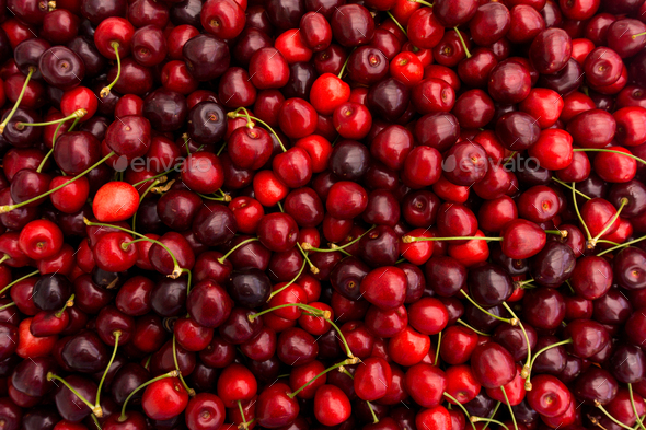 cherry background. Red ripe delicious cherries Stock Photo by EwaStudio
