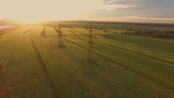 Aerial View Of a Landscape With Power Lines alt