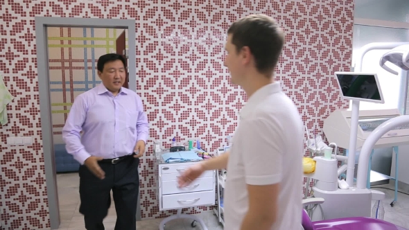 The Man Is Coming To Dentist Office For Health Care And Healing Teeth. alt