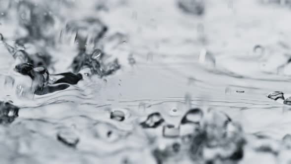 Macro Shot of Rain in Super Slow Motion Shooted with High Speed Cinema Camera at 1000Fps alt