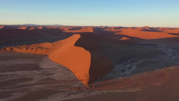Aerial view of sand dunes of Namib Desert, Namibia. alt