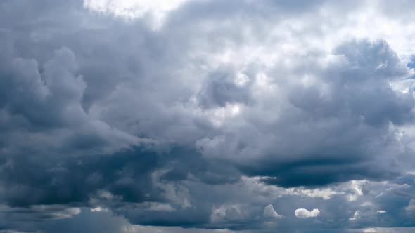 Timelapse of Gray Cumulus Clouds Moves in Blue Dramatic Sky Cirrus Cloud Space alt